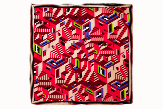 Flat lay image of 100% silk square scarf featuring a motif of interlocking staircases and platforms in various shades of red accented with pops of blue and green. A neutral stripe border around the scarves' edges.