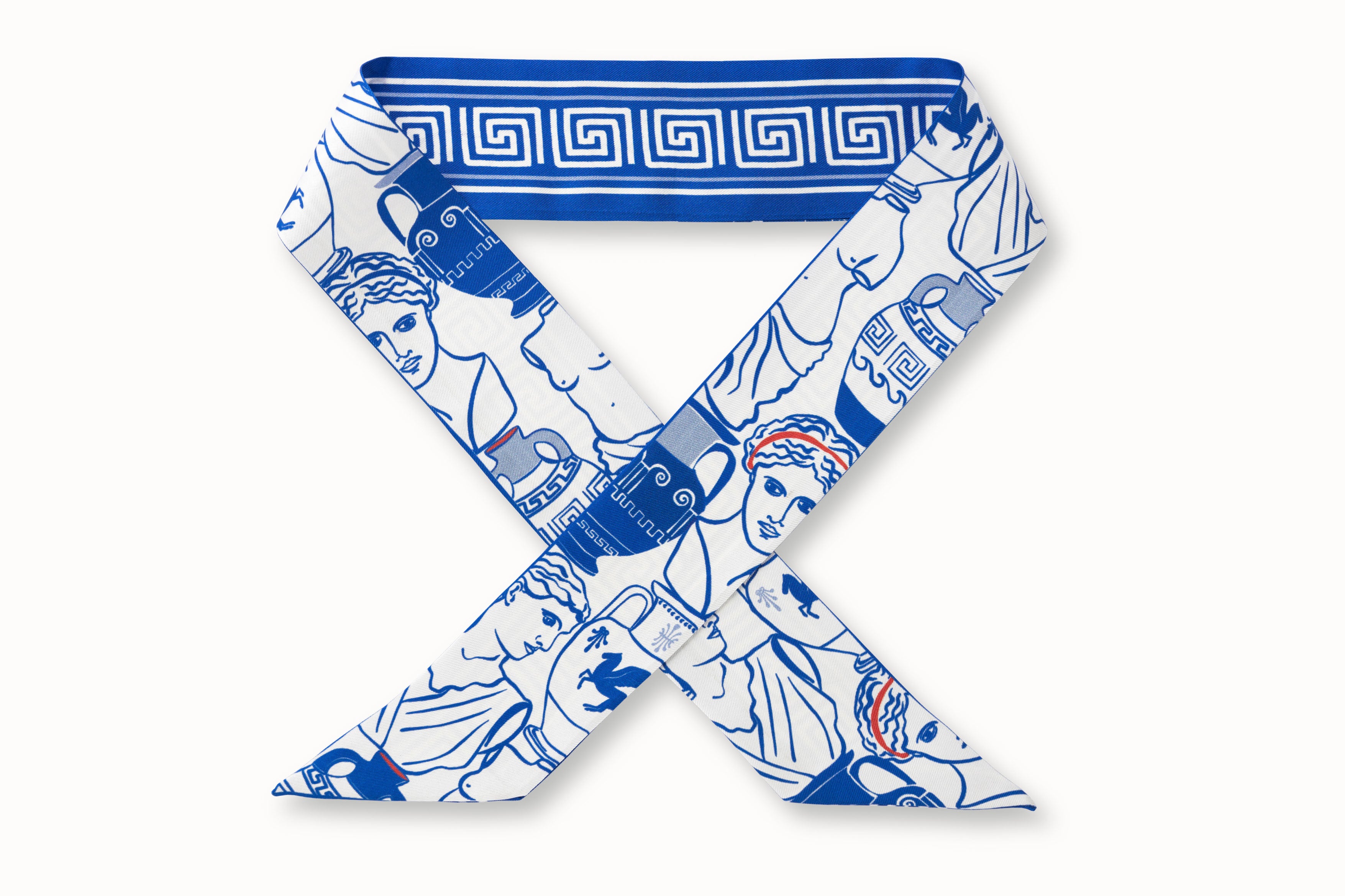 blue patterned scarf presented as a neck tie