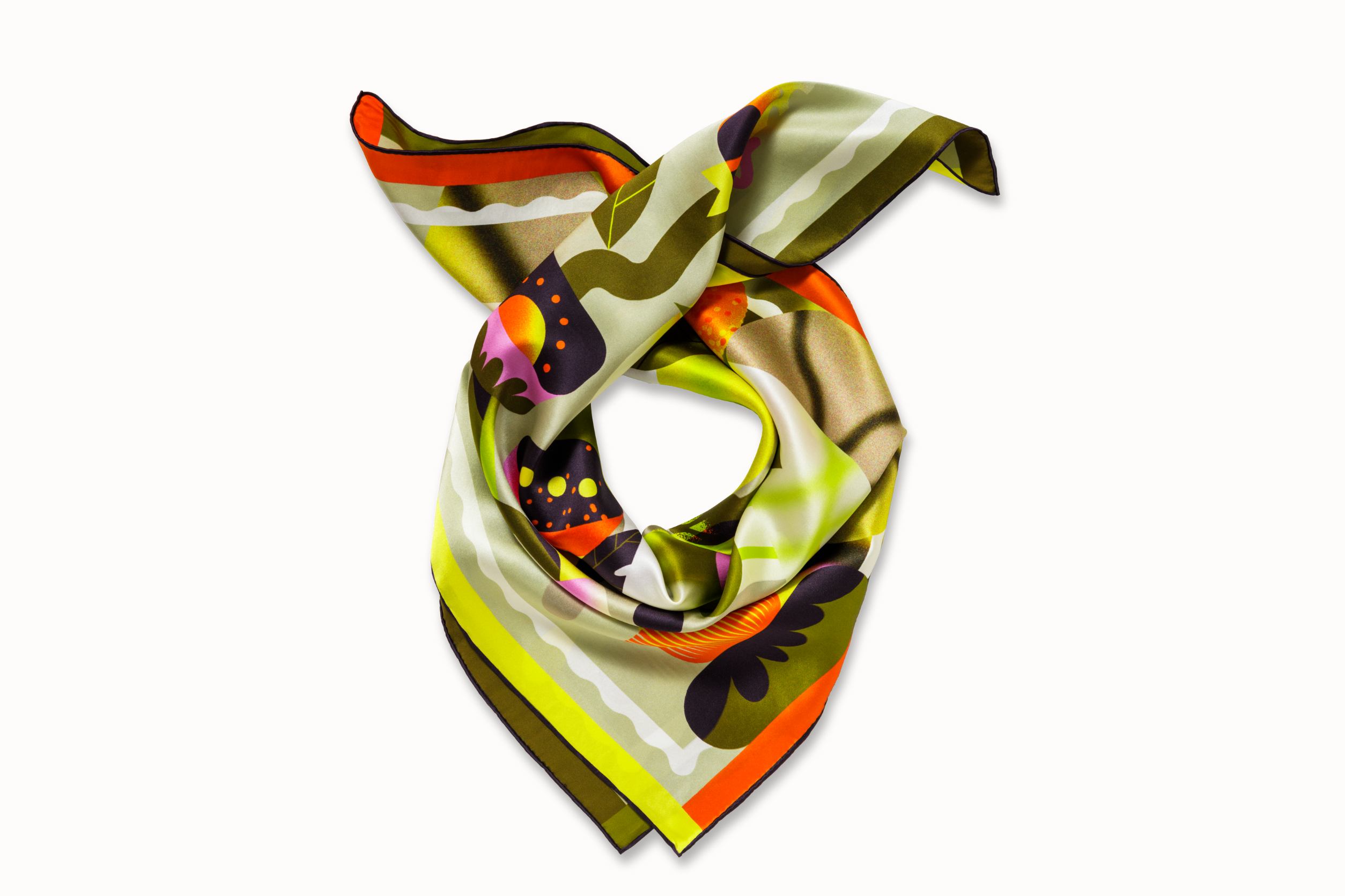 Rolled image of 100% silk square scarf featuring a collage of fruits, vegetables, and flowers in luscious shades of green and yellow, with pops of orange and pink throughout