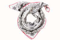 Rolled image of 100% silk square scarf featuring a  line illustration motif of zodiac, moon phases + the natural elements in black against a white background. Cranberry red border around the scarves' edges.
