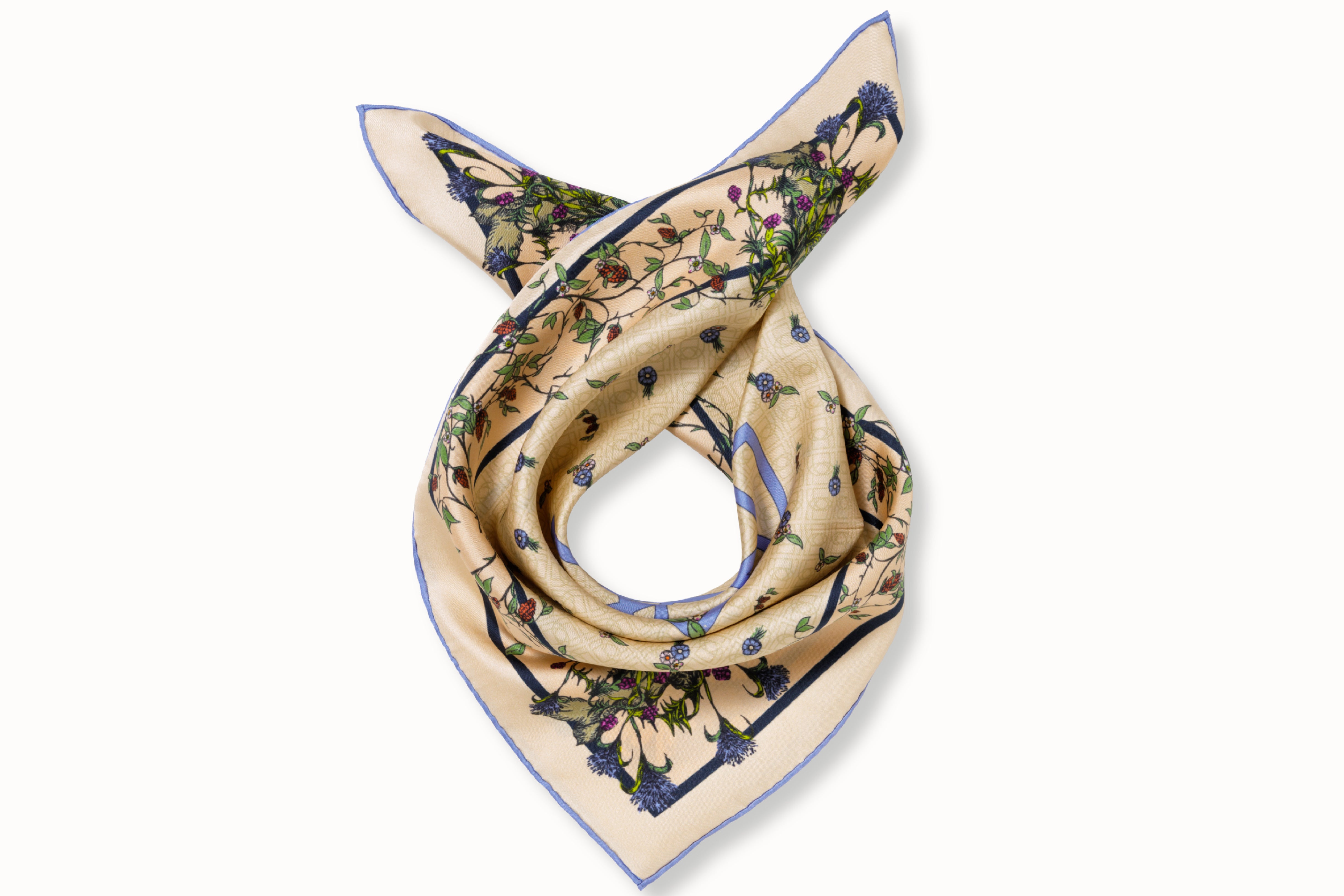 Rolled image of 100% silk square scarf  featuring an English garden-inspired floral illustration motif with a periwinkle blue version of the brand logo dominantly featured in the middle of design against on a warm neutral background and a periwinkle blue edge.