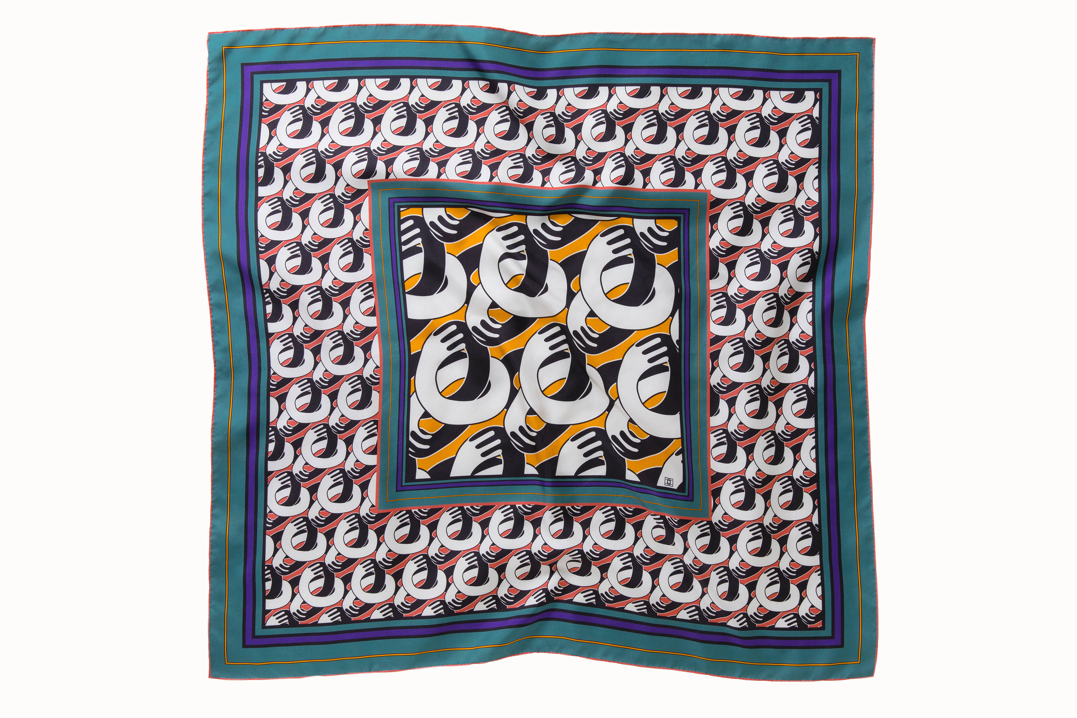 Flatlay image of 100% silk square scarf featuring a motif of black and white intertwined hands. The larger scale hands motif in the center is on a pumpkin colored background and is surrounded by smaller scale hands on a pink coral colored background. The scarf has a green and purple border.