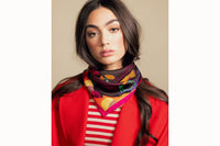 female model wearing scarf and red blazer