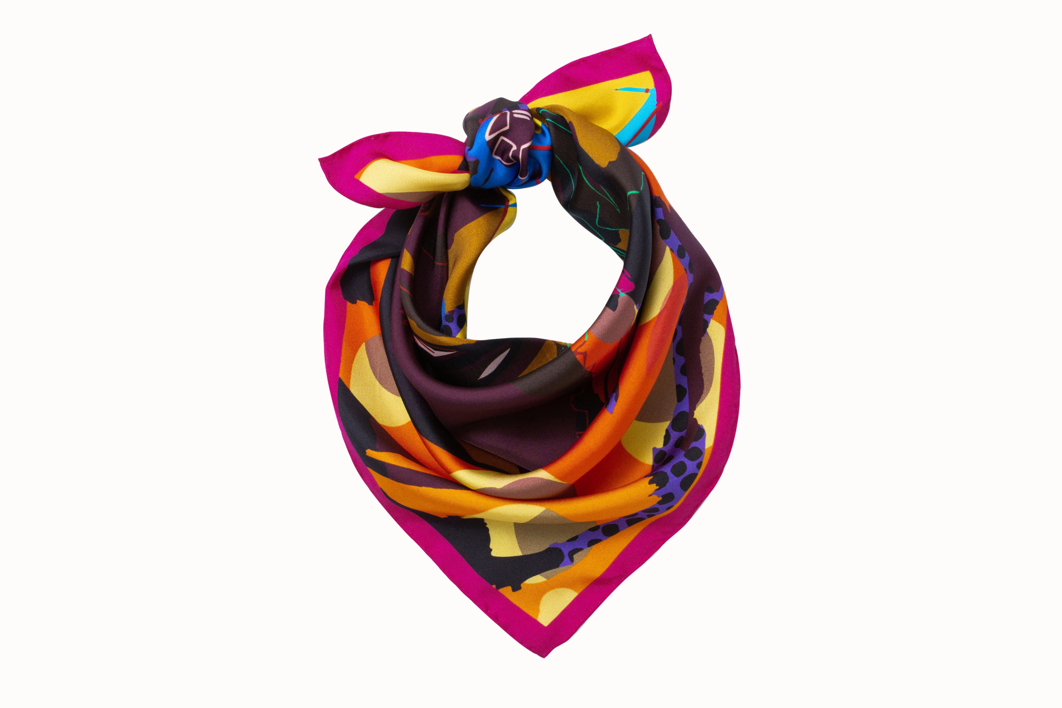 Rolled image of 100% silk square scarf featuring the artist’s portrait of Nina Simone surrounded by bold geometric shapes and featuring such colors as tangerine, citrus yellow, bright blue, burgundy and deep mahogany.