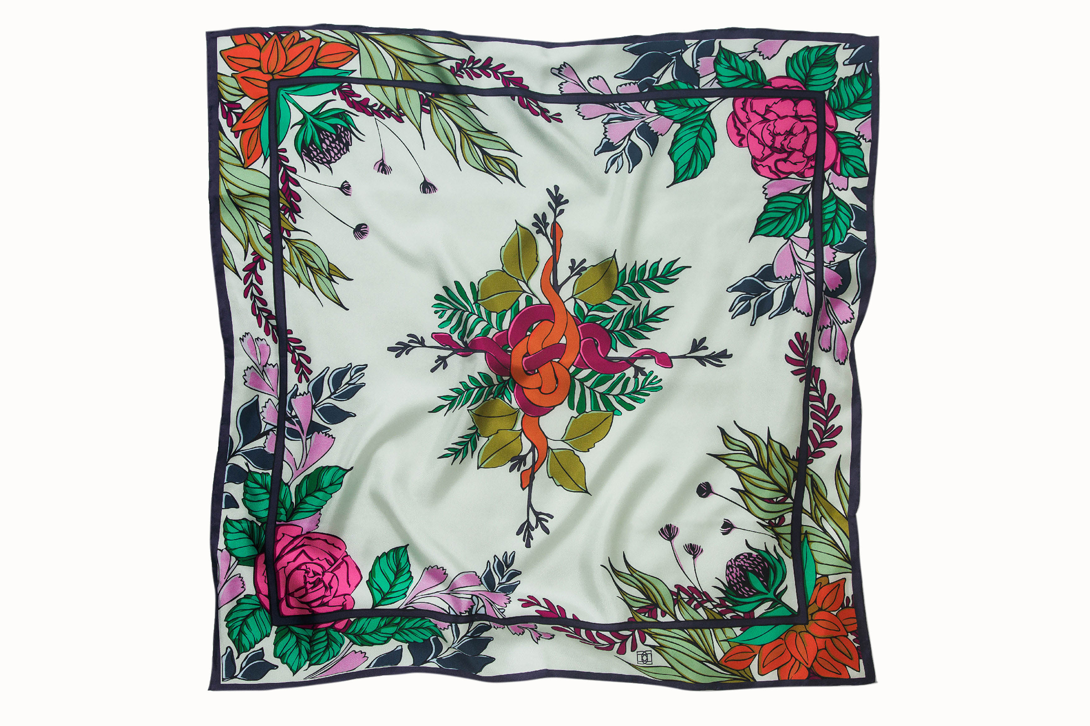 Flatlay image of 100% silk square scarf featuring a motif of bright, bold florals and greenery around the border as well as in the center of the scarf wrapped around two knotted garden snakes. Colors featured in include various shades of vibrant green, orange, lilac and rose pink on a very light and soft mint background.