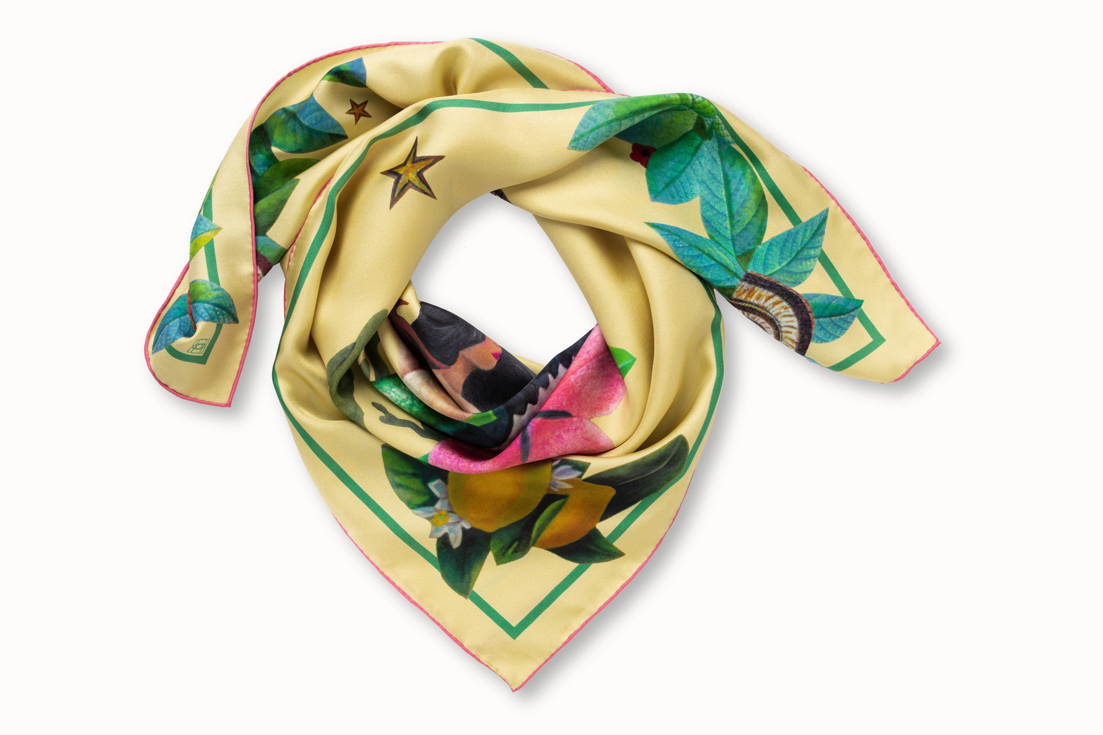 Rolled image of 100% silk square scarf featuring two painted two mermaids resting on large sea shells, a pink flower and green seaweed on a lemon yellow background with small butterfly accents. Thin green border around the edges of the scarf, layered with green leaves, seashells and lemons.