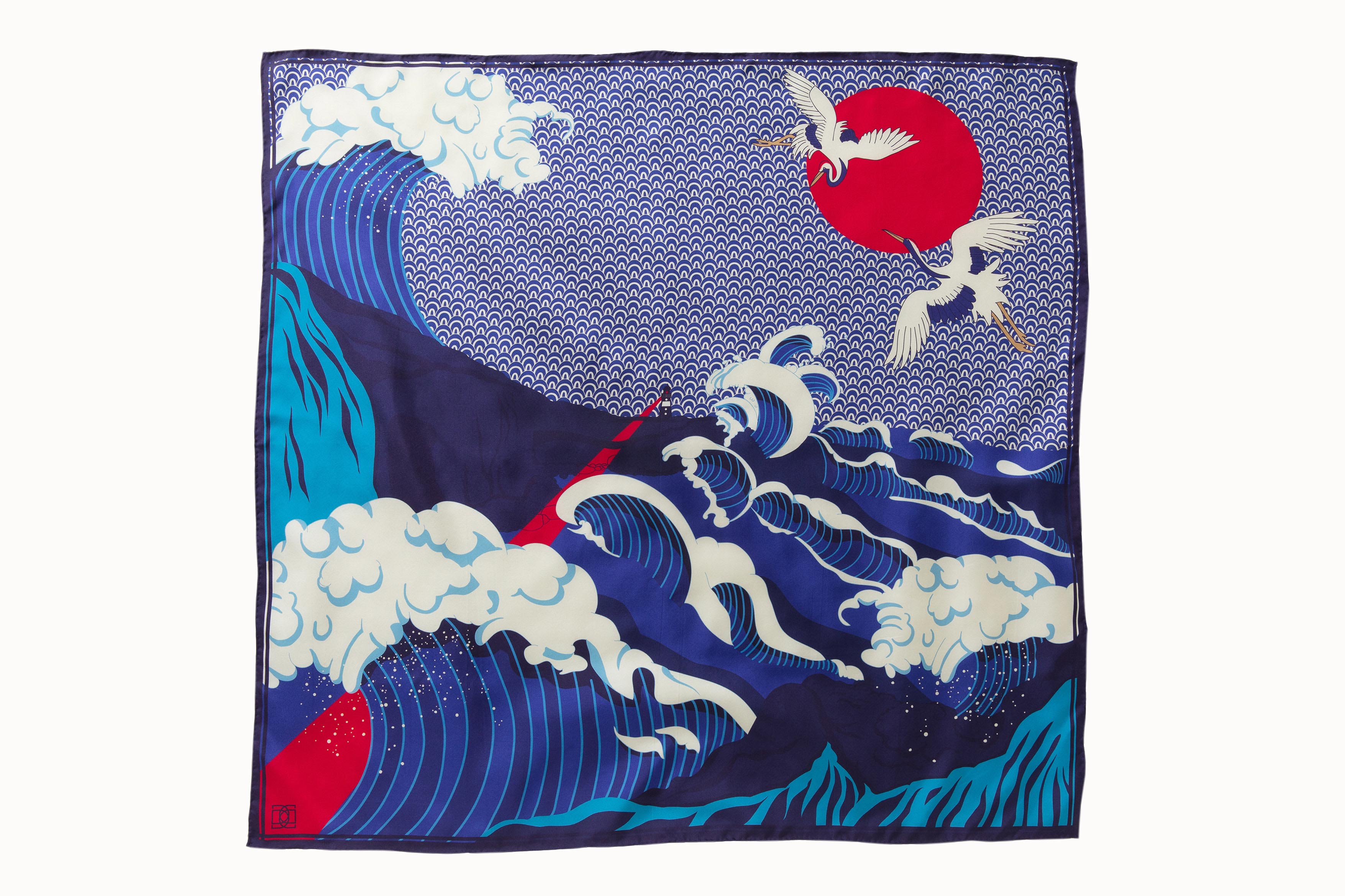 Flatlay image of 100% silk square scarf featuring an illustration of large crashing waves against a blue and white patterned background with small lighthouse and two cranes flying in front of the moon. Colors include various shades of blue, from deep navy to royal to French blue, as well as warm red and cream.