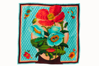 Flatlay image of 100% silk square scarf featuring a vivid floral collage of bright turquoise, coral and orange abstractly resembling a human portrait.